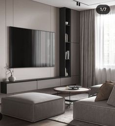 a living room with two couches and a television on the wall in front of it