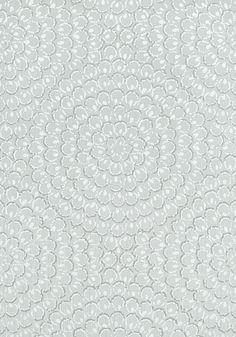 a white wallpaper with an intricate design