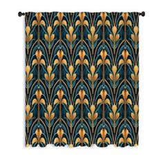 a blue and gold wall hanging with an art deco style pattern on the back of it