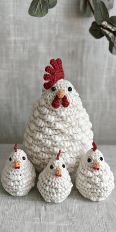 crocheted chicken family with three chicks