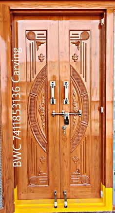 two wooden doors with decorative designs on them