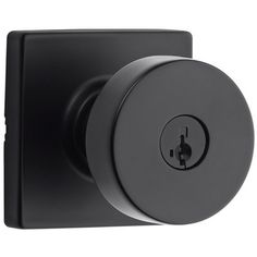 an image of a black door knob with a round handle on the front of it