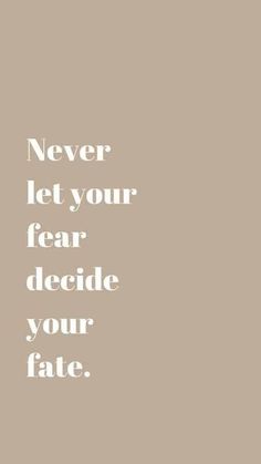 the words never let your fear decide your fate on a brown background with white lettering