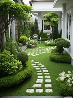 an outdoor garden with grass and stepping stones