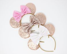 "● This listing ● ROSE GOLD sequin Mouse ears (sequin front and back) with YOUR CHOICE 5\" sequin bow on a sturdy headband ● Shipping ● We do our best to ship same day or the next business day (Holidays not included) ●We offer a wide variety of ears for all occasions, find all of our cute products here● https://www.etsy.com/shop/CutestLittleHeadwear ● Share ● Tag us @CutestLittleHeadwear on Instagram so we can show you some love! ● Listing photos credit ● @kirsten.v.kemp on Instagram @mamaneedst Rose Gold Disney Outfit, Disney Outfits Pink Ears, Pink Minnie Mouse Ears, Rose Gold Headband, Rose Gold Minnie Ears, Rhinestone Minnie Ears, Anna Victoria, Cute Products, Rose Gold Sequin