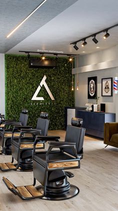 a salon with chairs and plants on the wall