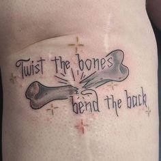 a tattoo on the side of a woman's stomach that reads, twist the bones bend the back