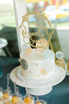 a white cake sitting on top of a table