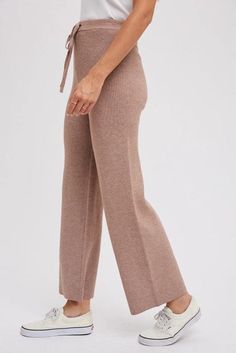 These ribbed sweater pants feature an elastic waistband, ensuring a comfortable and adjustable fit with a self tie waistband. The wide-leg design offers a relaxed and flattering silhouette, making these pants a versatile choice! 48% viscose, 27% polyester, 25% nylon Size chart: Small: waist 25"-27" Medium: waist 28"-29" Large: waist 30"-31" Mid Length Shorts, Leg Design, Sweater Pants, Ribbed Sweater, Small Waist, Wide Leg, Size Chart, Elastic, Pants