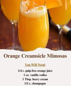 orange creamsice mimosas recipe in glasses with an orange wedge on top