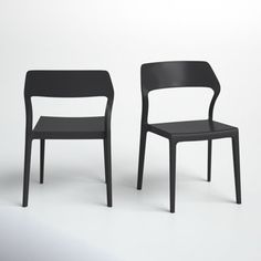 two black chairs sitting next to each other