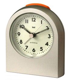 an alarm clock with orange hands and numbers on the face is shown in front of a white background