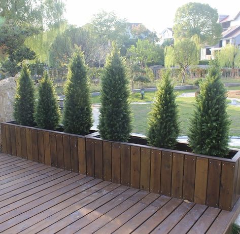 UV rated for outdoor low maintenance use. Tree Planters Landscape, Large Potted Trees Outdoor, Potted Arborvitae Patio, Artificial Landscaping Ideas, Outdoor Potted Trees, Artificial Shrubs Outdoor, Faux Trees Outdoor, Arborvitae In Pots, Fake Plants Outside Landscaping