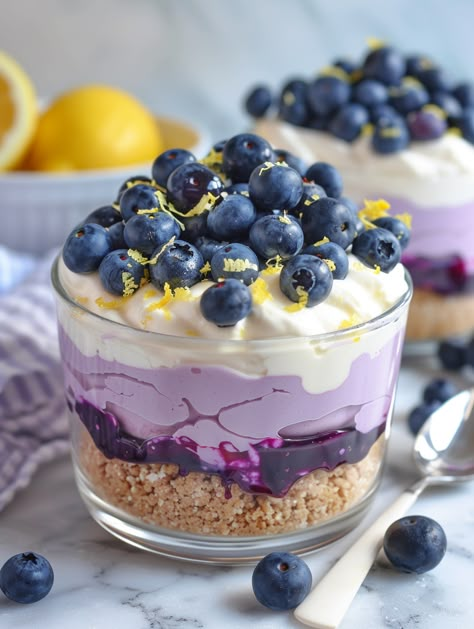 Lemon Blueberry Cheesecake Mousse 🫐   𝗜𝗻𝗴𝗿𝗲𝗱𝗶𝗲𝗻𝘁𝘀: 🫐 - 1 cup graham cracker crumbs - 1/4 cup granulated sugar - 1/4 cup unsalted butter, melted - 8 oz cream cheese, softened - 1/2 cup granulated sugar - 1 cup heavy cream - 1/4 cup lemon juice - 1 teaspoon lemon zest - 1 cup fresh blueberries - 2 tablespoons blueberry jam or preserves Lemon Blueberry Cheesecake, Dessert Cups Recipes, Cheesecake Mousse, Blueberry Desserts, Blueberry Jam, Blueberry Recipes, Yummy Comfort Food, Tasty Baking, Blueberry Cheesecake