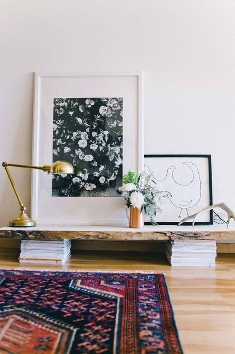 If you don’t want to lean your artwork directly on the floor, then prop it up on a stand. | 21 Cheap And Easy Decorating Tricks For Renters Wallpaper Geometric, Wit And Delight, Wallpaper Winter, Colorful Interior, Apartment Tour, Scandinavian Wall, Bathroom Top, Deco Boheme, A Rug