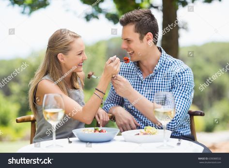 Happy couple feeding food to each other in a restaurant #Ad , #Affiliate, #couple#Happy#feeding#restaurant Man Proposing, Couple Poses Drawing, Restaurant Ad, Film Life, Eat Together, Fire Emblem Awakening, Japan Aesthetic, Human Poses Reference, Human Poses