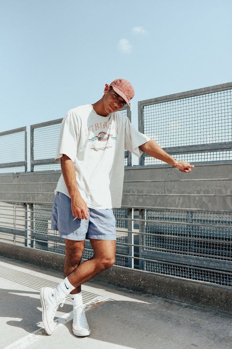 Find a look like this on The Real Trendy Traps website. Just some inspiration on how to style a large shirt with some short pants. #summer #vintage #fashion #mens #style #TheTrendyTrap #inspiration #inspo #90s #outfit #outfits #streetwear 90s Fashion Men Summer, Vintage Streetwear Men, Summer Fits Men, Skate Outfit, Mens Street Style Summer, Vintage Outfits Men, Mens Summer Outfits, Mens Trendy Outfits, Outfits Streetwear