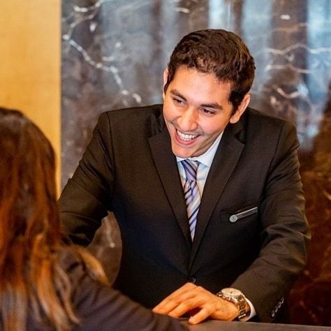 Service always comes with a smile at #FSBeirut. Meet Nader Kabbara, front desk agent. What’s the favorite part of his job? “I love having the pleasure to welcome guests and assist them from the moment they arrive at our property until their departure day". #MeetTheTeamMonday #FourSeasonsBeirut ( Photo by: @davegershman) #frontdesk #fsbeirut #fourseasons #suitandtie #beirut #jacket #emilerassam #uniforms #sartorial #style #hotel #hotels #ootd #totallook Front Desk Agent, Hotel Uniforms, Sartorial Style, In Smile, Hotel Uniform, Hotel Reception, Hotel Staff, Front Office, The Favorite