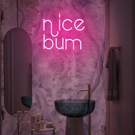 Nice Bum Neon Sign, a fun and colorful piece of wall decor that adds a touch of humor and playfulness to your bathroom, bedroom, or gallery wall. This neon sign features the word "Nice Bum" in a vibrant pink color, creating a cheerful and eye-catching display. The "Nice Bum" Neon Sign is the perfect addition to your bathroom or bedroom decor if you're looking for a fun and lighthearted touch. Its bright neon lights bring the sign to life, adding a vibrant glow that enhances the ambiance and crea Funny Neon Signs, Bedroom Colourful, Colourful Gallery Wall, Fun Art Print, Red Quotes, Sign For Bedroom, Pink Neon Sign, Funny Bathroom Art, Quote Decor