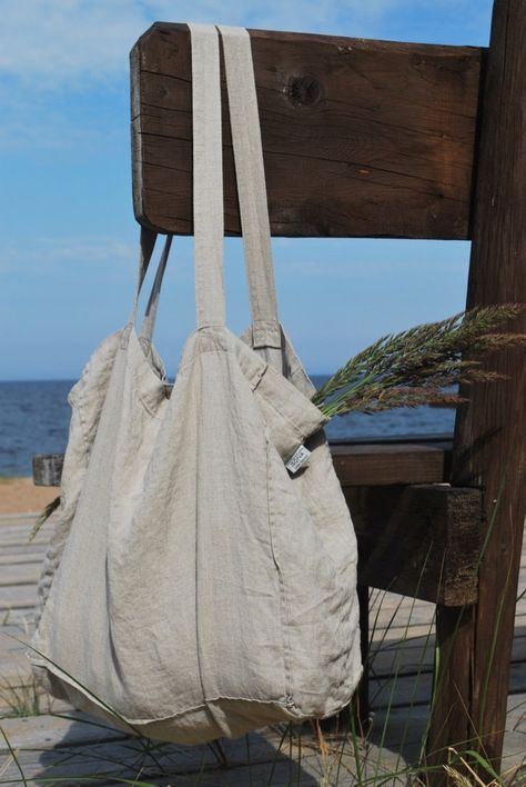 Tote bag is handmade from pure, soft washed linen and has inside pocket. Linen tote bag is a perfect accessory whether you are doing shopping or going to the beach. Long handles that go over the shoulder make it comfortable to carry. This tote bag is very light, thus when not used it can be easily folded away.  COMPOSITION - 100% linen, soft washed - Medium weight linen - Oeko-tex certified fabric, that does not contain any harmful substances and meets human-ecological requirements.  SIZE - Heig Large Beach Bag, Linen Tote Bag, Tote Bag With Pockets, Large Beach Bags, Eco Friendly Bags, Handmade Tote, Tote Bags Handmade, Summer Bag, Reusable Shopping Bags