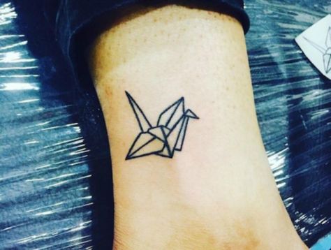 16+Tiny+Tattoos+With+BIG+Meanings Mojito Tattoo, Paper Crane Tattoo, Origami Tattoo, Crane Tattoo, Tiny Tattoos For Women, Ankle Tattoo Designs, Shape Tattoo, Small Tattoos With Meaning, Small Girl Tattoos