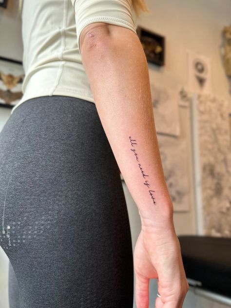 Arm Tattoos For Women Letters, Writing Down Forearm Tattoo, Side Arm Cursive Tattoo, Forearm Handwriting Tattoo, Tattoo Placement Ideas Forearm, Arm Tattoo Placement Words, Quote Wrapped Around Arm Tattoo, Quotes Arm Tattoo, Tattoo Writing On Forearm