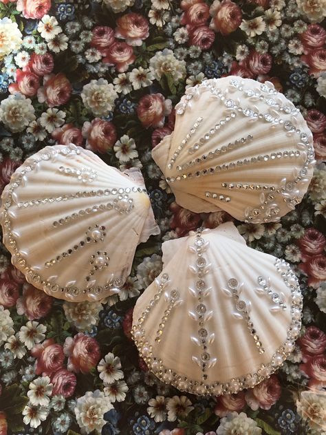 Excited to share this item from my #etsy shop: Sea shell ornament, beach wedding ornament, coastal decoration ornament, large white scallop shells decorated with gems, beads and pearls. #wedding #beachnaturalshells #whitescallopshells #giantwhitescallop #krscreations #freeshipping #giftsforher Bridesmaids Baskets, Decorated Shells, Sea Ornaments, Beach Themed Room Decor, Seashell Diy, Bridesmaid Baskets, Seashell Creations, Sea Shells Diy, Seashell Wedding