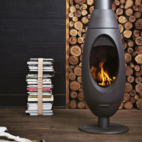 10 wood-burning stoves that will make you want to ditch your furnace Curved Fireplace, How To Clean Burners, Modern Wood Burning Stoves, Standing Fireplace, Stoves For Sale, Wood Heater, Freestanding Fireplace, Stove Fireplace, Wood Fireplace