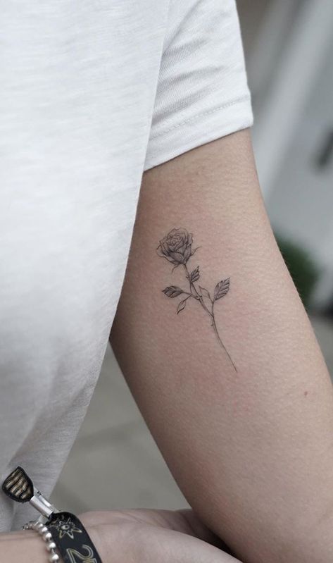 Rose On Back Of Arm, Minimalist Rose Tattoo Men, Rose Clavicle Tattoo, Back Arm Tattoo Women Minimalist, Simple Arm Tattoo Men, Rose On Forearm Tattoo, Rose Tattoo Back Of Arm, Many Small Tattoos Arm, Minimalist Tattoo Rose