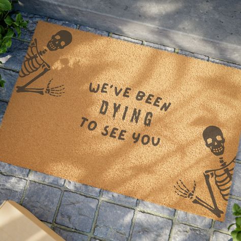 The perfect spooky door mat to complete your Halloween porch décor! DETAILS: .: One size: 24" × 16" .: Black vinyl backing .: Grade A tufted coir coconut fiber .: Adjustable shoulder straps .: Made in the USA CARE: .: Place your mat in a covered, weather-protected area such as under an overhang, awning, etc.  .: Do not expose to direct sunlight or excessive moisture.  .: Because these mats are made with natural coir fibers, there may be some initial shedding over the first month of use, it can be easily removed by occasionally shaking the mat to get rid of the loose fibers. Every item is made to order! If your item arrives and you are unsatisfied with the quality, please feel free to message me and I will do my best to respond within 24 hours. Thank you for supporting my small business! Halloween Rugs Diy, Halloween Door Mat Diy, Diy Halloween Doormat, Spooky Door, Halloween Rugs, Door Mat Diy, Halloween Doormat, Halloween Front Doors, Fall Doormat