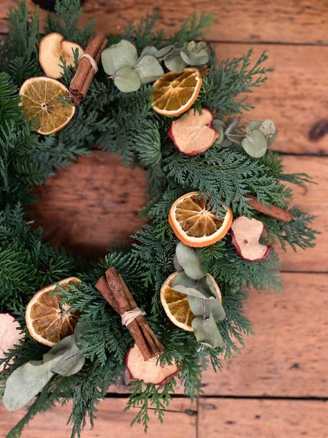 Oranges, apples, cinnamon on a spruce & fir base Cinnamon Wreath, Apples Cinnamon, Handmade Christmas Wreaths, Xmas Wreaths, Christmas Inspo, Handmade Wreaths, Pine Cones, Christmas Wreath, Handmade Christmas