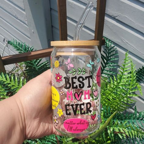 Best Mom Ever 🌸✨️💐✨️💖 • • • Mother's Day is May 12th! • • • Available in both Glass Can 16 oz. with Bamboo Lid & Glass Straw & Acrylic Can 16 oz. with Plastic Lid & Straw • • • Available on idigbeauty.com & my Etsy Shop ✨️ _________________________ #iDigBeauty #momscup #momsday #mothersday #glasscan #cutecup #coffeecup #cafecito #explorepage #trending #Oldtownspring Best Mom Ever, Glass Straws, Cute Cups, Best Mom, Mother’s Day, Mother's Day, Coffee Cups, Mothers Day, Straw