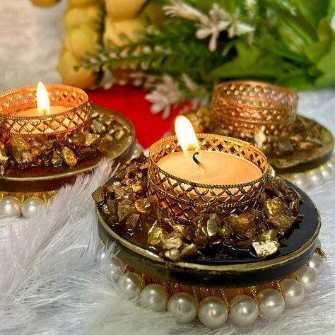 Style 1 tea light holders. 🥰 . ✨ Illuminate your space with elegance! These handmade resin diyas combine the grace of pearls with a touch of tradition, perfect for creating a serene and stylish vibe. Light up your celebrations with this timeless beauty. 🕯️💛 #HandmadeDiya #ResinArt #FestiveGlow #TraditionalElegance #DIYDecor #rupaligoyal #myshcraftsbyrupaligoyal #myshcraftsbyrupali #handmaderesinhomedecor #homedecor Resin Diyas, Tea Light Holders, The Grace, Tea Light Holder, Resin Art, Timeless Beauty, Tea Lights, Light Up, Diy Decor