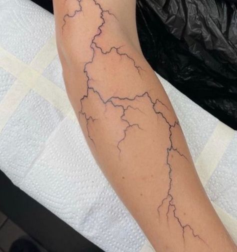 Lighting Forearm Tattoo, White Lightning Tattoo Shoulder, Blue Lightning Tattoo, Lightning Bolt Tattoo Hip, White Ink Lightning Tattoo, Lightning Tattoo Shoulder, White Lightning Tattoo, Vein Tattoos, Mens Side Tattoos