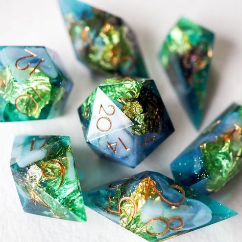 Green Atlantis💚💫 . ✨Available! Link in bio✨ . . . . . . . . . . . . . . . . . . . . . . . . . . . . . . . . . . . . . . #dice #handmade… | Instagram D&d Dice Aesthetic, Dice Making, Green Dice, Green Dnd Dice, Dice Collection, Dice Dragon, Crystal Dice, Dice Goblin, Blue Dnd Dice