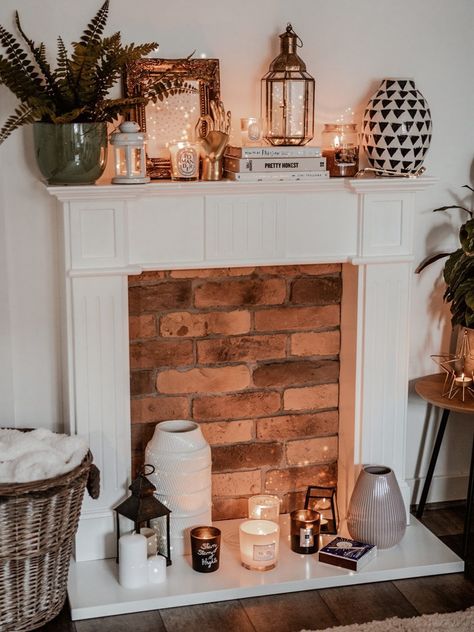 new year fireplace 1 Build A Faux Fireplace, Fake Fireplace Diy, Empty Fireplace Ideas, Small Electric Fireplace, Vintage Living Room Design, Diy Faux Fireplace, Fireplace Box, Modern Farmhouse Fireplace, Space Building