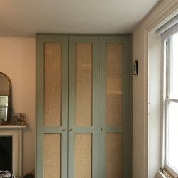 Rattan doors wardrobe built in the chimney alcove. Loft Conversion Wardrobes, Rattan Wardrobe, Floor To Ceiling Wardrobes, Alcove Wardrobe, Alcove Cabinets, Alcove Cupboards, Doors Wardrobe, Small Space Nursery, Rattan Doors