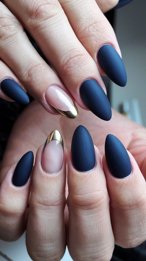 Elevate your nail game with this stunning matte navy and gold accent manicure! Featuring a chic mix of matte nails and a glamorous gold tip, this design is both elegant and modern. The unique nude accent nail adds a trendy twist, making it perfect for any occasion. Get inspired to try this sophisticated look! #NailArt #MatteNails #NailInspiration #septembernails #fallnails Navy Nails Gold Accent, Navy Blue Nails Matte Art Designs, Fall Nails Navy Blue And Gold, Navy Autumn Nails, Elegant Navy Blue Nails, Navy And Copper Nails, Navy Blue Tips Nails, Nails To Go With Navy Dress, Fall Navy Nails