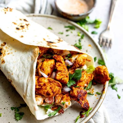 Cajun chicken wraps are bold with spicy flavors, juicy chicken and a great simple creamy sauce. You will love these wraps. Cajun Chicken Ceaser Wraps, Cajun Chicken Caesar Wrap, Cajun Chicken Wrap, Cajun Chicken Wrap Recipe, Spicy Cajun Chicken, Southwest Chicken Wraps, Spicy Chicken Wrap, Chicken Wraps Healthy, Crispy Chicken Wraps