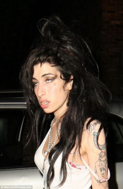 Grammy award-winning singer Amy Winehouse is facing arrest and a possible six month jail sentence after she allegedly attacked TWO men while on a drug-fuelled bender. Amy Winehouse Albums, Bad Girl Style, Amazing Amy, Gone Girl, Amy Winehouse, Two Men, Hendrix, Grammy Awards, Her Music