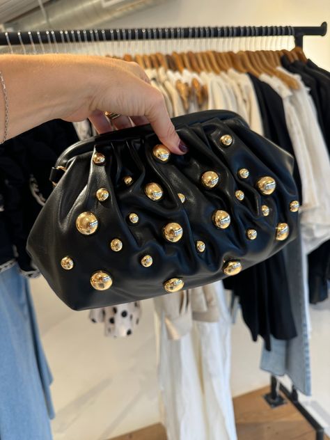 Elevate your style with this chic handbag featuring one sided studded clutch. Perfect for adding a touch of sophistication to any outfit! Magnetic claps 1 inside pockets Detachable strap Measurements: Width: 14” Height: 9” Studded Clutch, Studded Bag, 2024 Style, 2024 Christmas, Dream Style, Classic Wardrobe, Fashion 2024, Rhinestone Studs, Chic Handbags