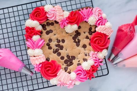 Valentine Cookie Cake, Cookie Heart Cake, Valentine Cookie Cake Ideas, Cookie Cake Valentines, Valentines Cookie Cake Decorating Ideas, Cookie Cake Valentines Day, Heart Cookie Cake, Valentine’s Day Cake, Heart Shaped Cookie Cake