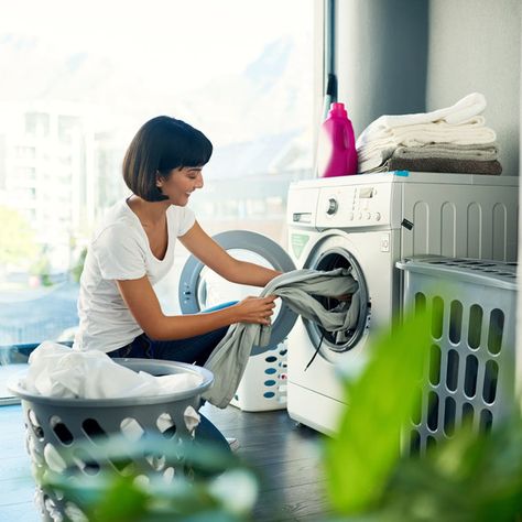 Woman Doing Laundry at Home Shrink Clothes, Washing Machine Repair, Diy Cleaning Solution, Bra Hooks, Delicate Clothes, Doing Laundry, Laundry Service, Dry Cleaners, Laundry Hacks