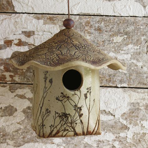 Slab built bird house I made a long time ago. I've sold a lot of these but never kept any for myself. Might have to make a few more. #gardening #birdhouses #birdhouseideas #slabbuilt #slabbuiltceramics #ceramics #design #decoration #floraldecoration #style #gardenlove #art #colleenhuth #colleendeissdesigns Ceramic Birdhouse, Bird House Feeder, Clay Bird, Bird House Kits, Bird Aviary, Diy Bird Feeder, Decorative Bird Houses, Garden Pottery, Slab Pottery