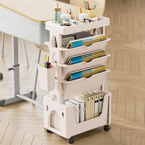 PRICES MAY VARY. Unique Design：The unique design of this rolling book shelf with wheels allows for easy access to your books from both sides, making it convenient for quick retrieval or storage. Sturdy Construction: The sturdy construction of the unique bookshelf ensures durability and long-lasting use, making it a reliable and practical storage solution. Complementary: The green bookshelf adds a touch of style to any space, complementing a variety of interior decor styles. Wide Application: The Green Bookshelf, Summer Reset, Desk For Girls Room, Hobby Room Design, Small Office Storage, Green Bookshelves, Unique Bookshelf, Office Things, Unique Bookshelves