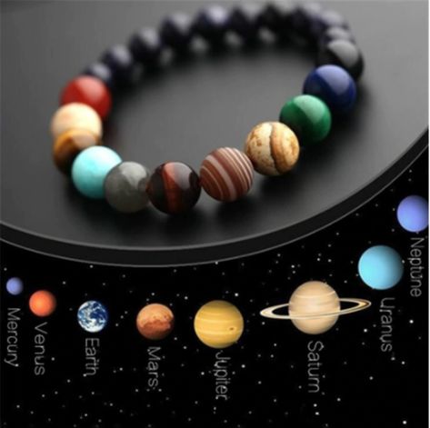 Inspired by our Solar System. We have chosen various natural stones that represent the 8 different planets - Mercury, Venus, Earth, Mars, Saturn, Jupiter, Uranus, Neptune. The stones have a remarkable similarity to the actual planets. Wear the entire Solar System on your wrist. Stone Type: Different Colored Agate, Map, Imperial, Tiger's Eye Planet Bracelet, Eight Planets, Solar System Bracelet, Bracelet Shop, Natural Stone Bracelets, Chakra Bracelet, Mens Beaded Bracelets, Strand Bracelet, Jewelry Bracelet