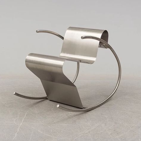 Design History: The Versatility of Stainless Steel in Interior Design Metal Chair Design, Tufted Rocking Chair, Metal Rocking Chair, Bauhaus Chair, Stainless Steel Chair, Deconstructivism, Rolling Chair, Metal Chair, Steel Chair