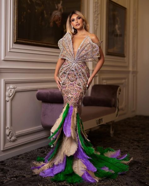 Sleeveless Luminescent Dress adorned with crystals and feathers. Feathered Dress, Dress With Crystals, Purple And Beige, Dress With Feathers, Bodycon Gown, Dress Crystal, Crystals Stones, Couture Dress, Ankle Length Dress