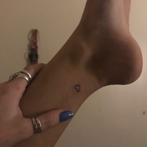 Small Heart Ankle Tattoo, Inside Ankle Tattoo Small, Ankle Tattoo Aesthetic, Heart On Ankle Tattoo, Heart Foot Tattoo, Ancle Tatoos Woman Simple, Ankle Tattoos Simple, Ankle Stick And Poke Tattoo, Ankel Tattoos Simple