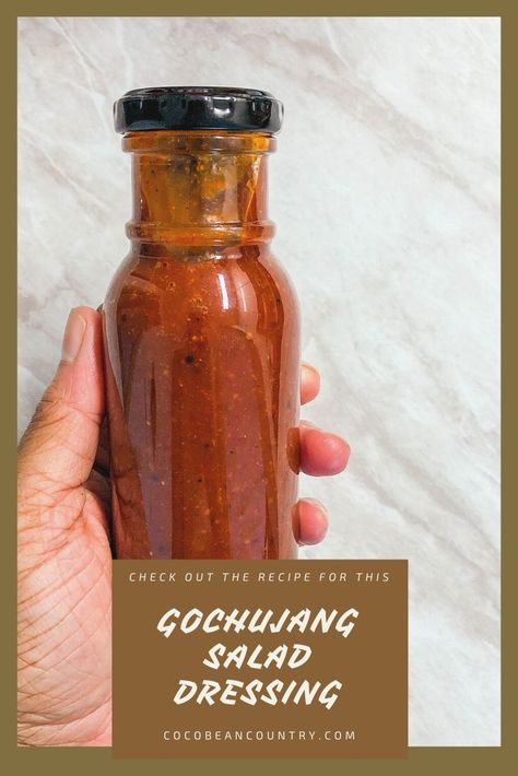 This is a picture of someone holding a bottle of gochujang salad dressing. Gochujang Cucumber, Gochujang Salad Dressing, Gochujang Cucumber Recipe, Vegan Recipes With Gochujang, Korean Cucumber Salad Gochujang, Salad Dressing, Sweet And Spicy, Side Dishes, Condiments